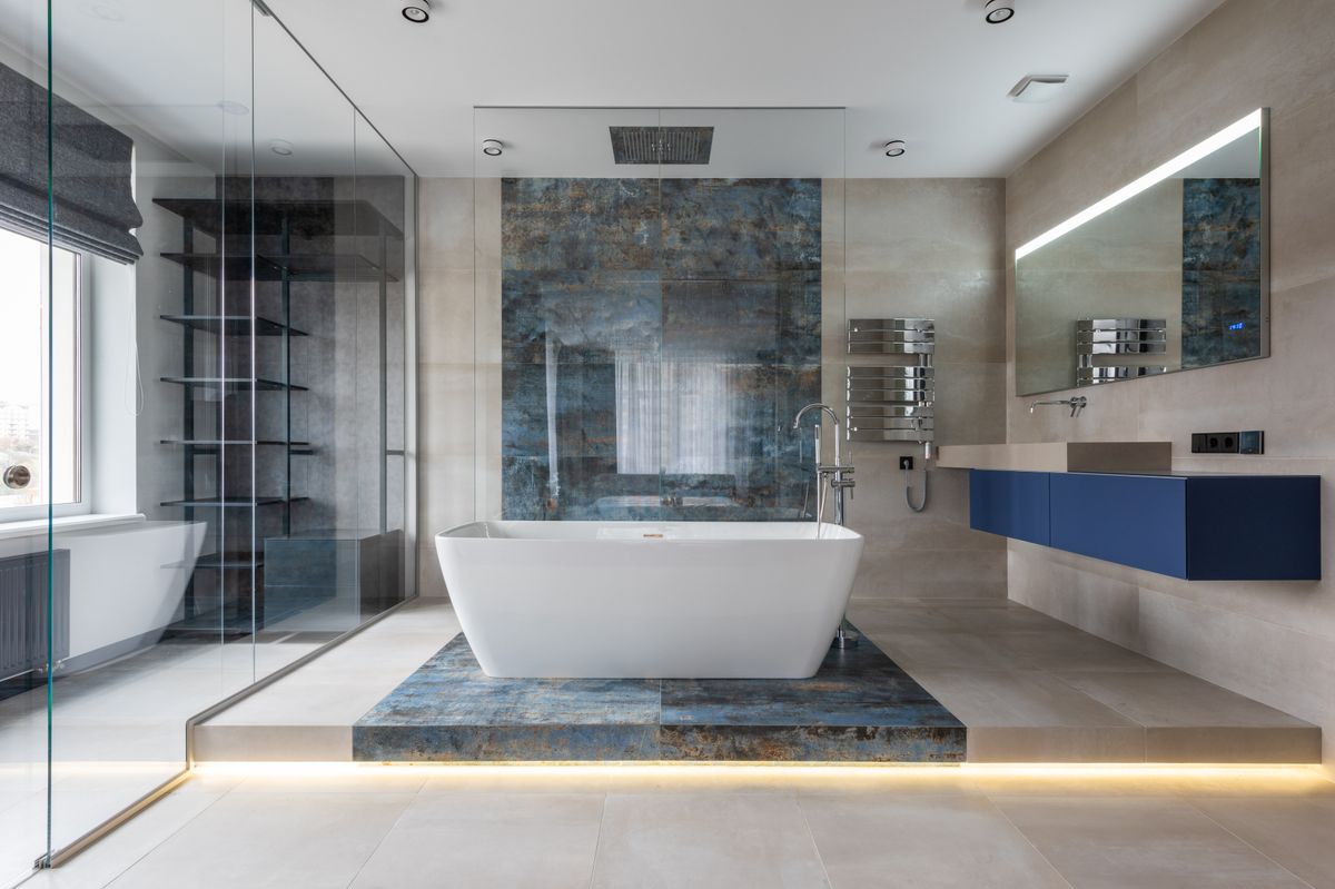 Bathroom with bath, basin and modern plumbing fittings